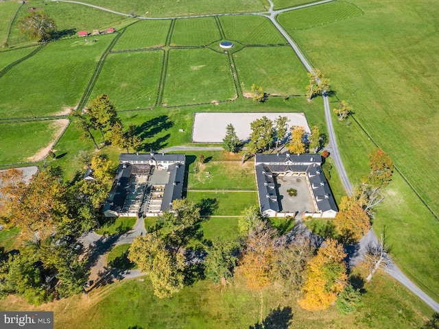 birds eye view of property featuring a rural view