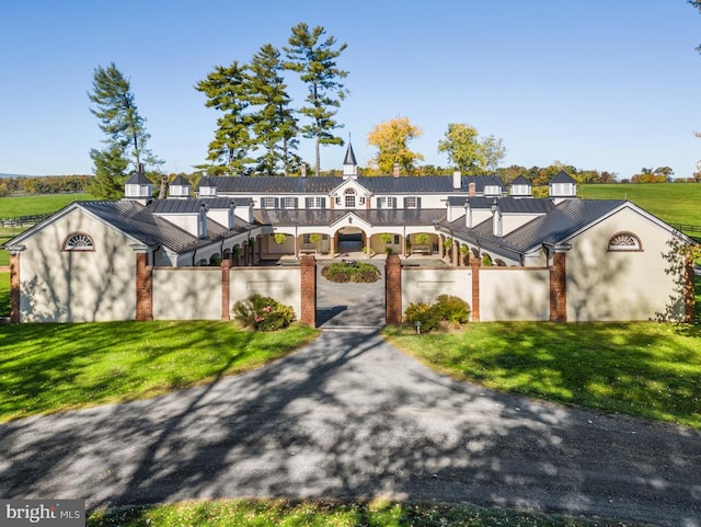 view of front of property with a front lawn