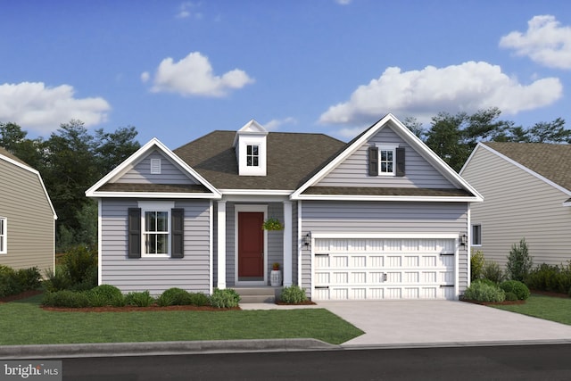 view of front of home with a garage and a front lawn