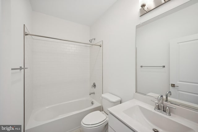 full bathroom with shower / tub combination, vanity, and toilet