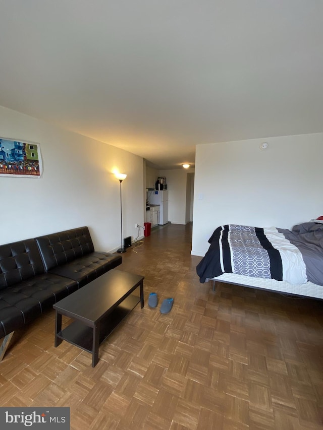 bedroom featuring parquet floors