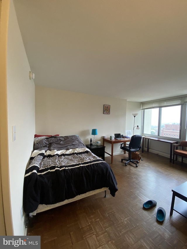 bedroom featuring parquet floors