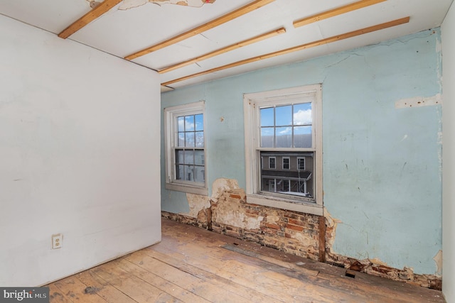 spare room featuring light hardwood / wood-style floors