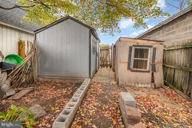 exterior space with a shed