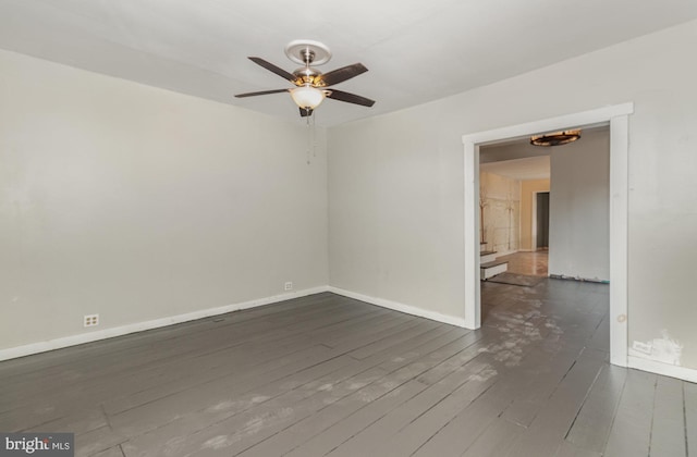 unfurnished room featuring dark hardwood / wood-style flooring and ceiling fan