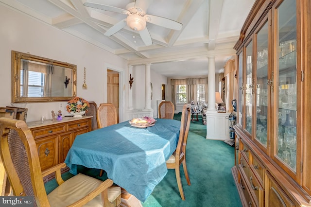 carpeted dining area with coffered ceiling, beam ceiling, ceiling fan, and ornate columns