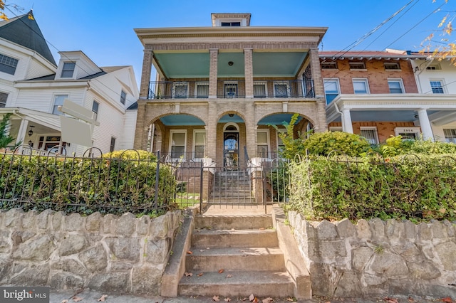 view of property with a balcony