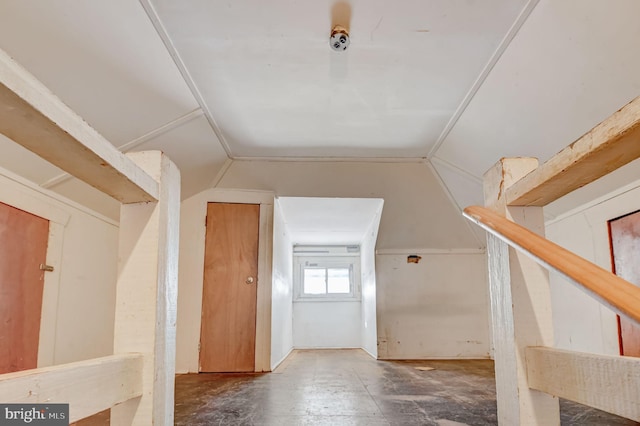 bonus room featuring vaulted ceiling