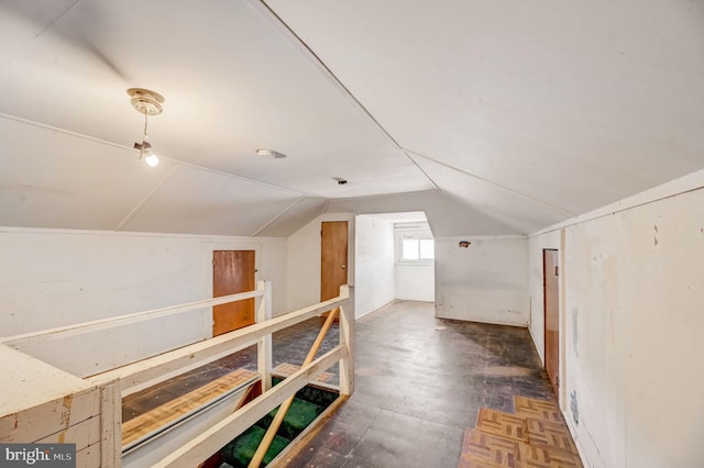 bonus room with vaulted ceiling