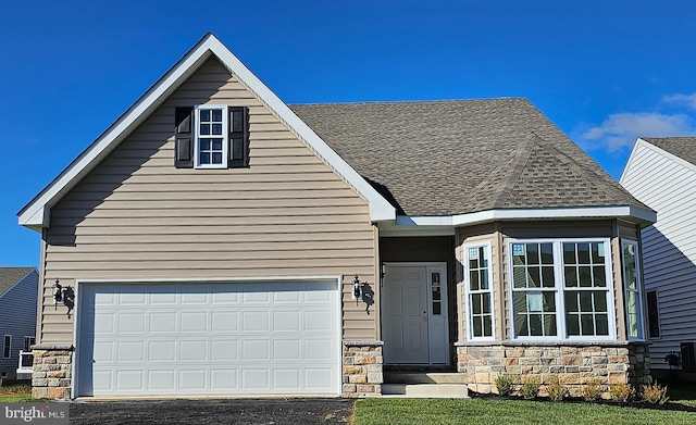 view of front of house with a garage