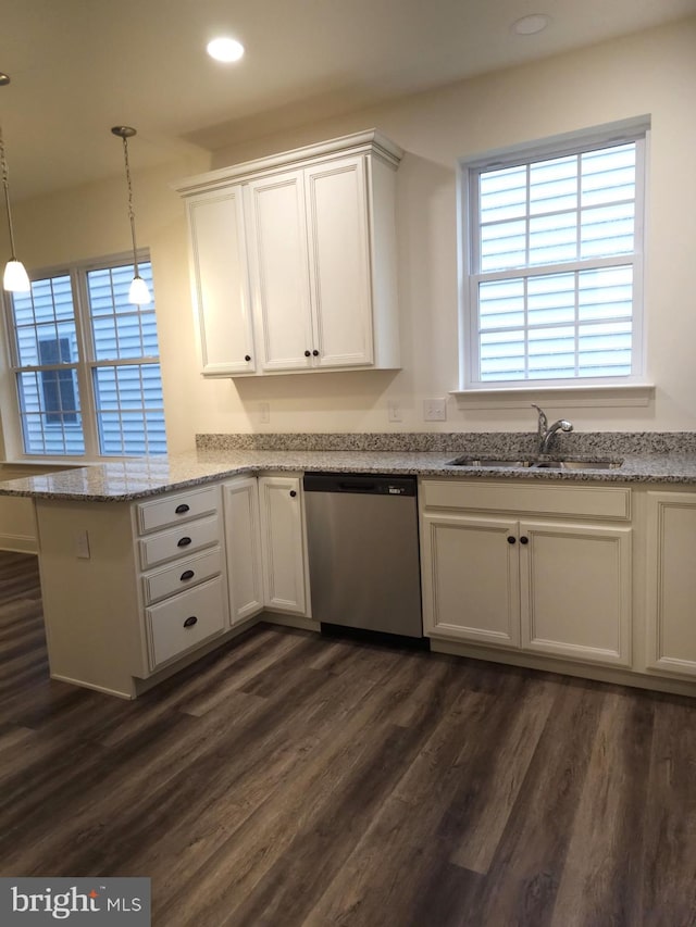 kitchen with white cabinetry, dishwasher, sink, hanging light fixtures, and dark hardwood / wood-style flooring