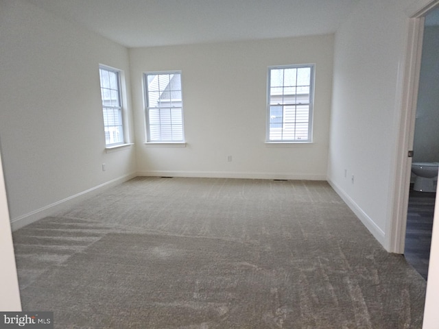 view of carpeted spare room