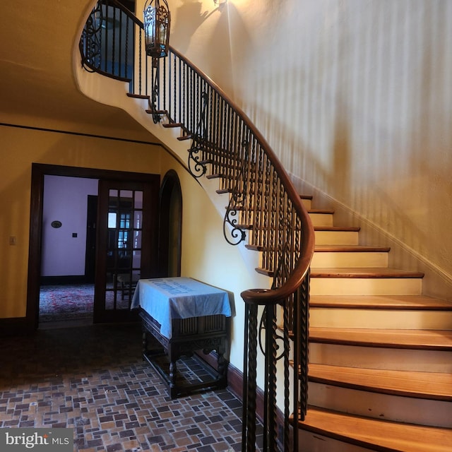 stairs with a high ceiling