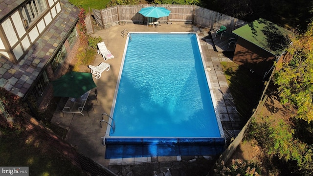 view of pool featuring a patio area