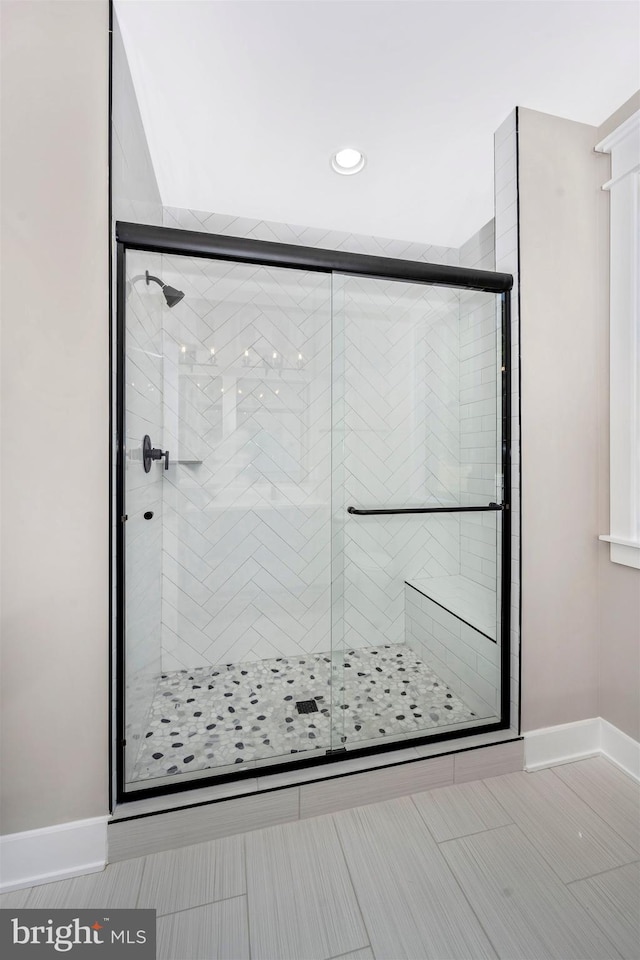 bathroom with an enclosed shower