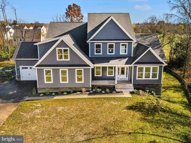 craftsman house with a front yard