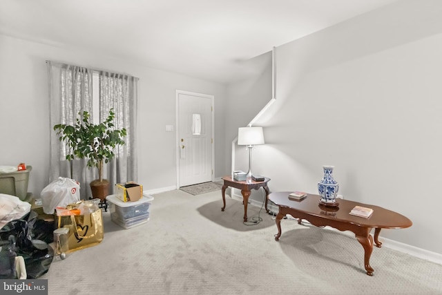 interior space featuring light colored carpet