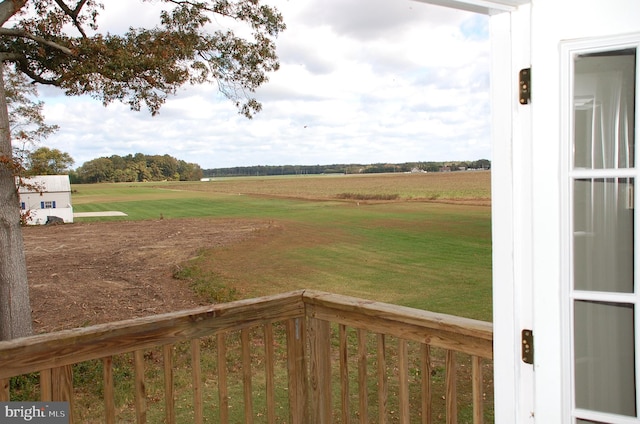 view of yard featuring a balcony