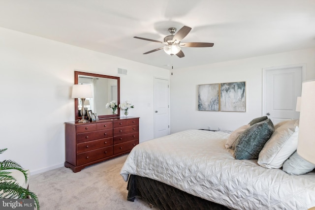 carpeted bedroom featuring ceiling fan