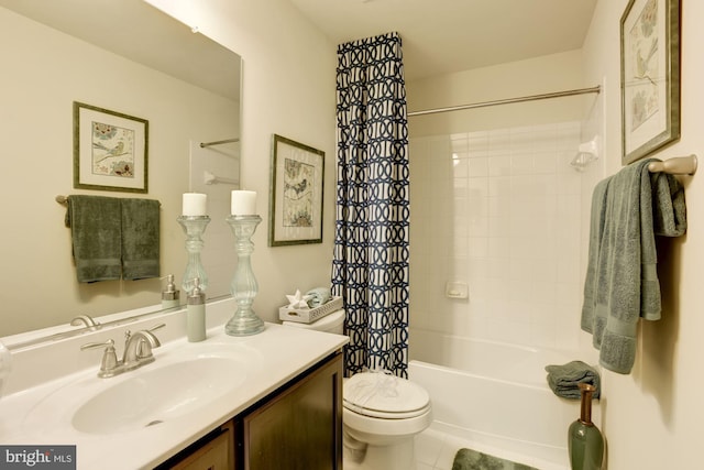 full bathroom featuring tile patterned floors, vanity, toilet, and shower / bath combo with shower curtain