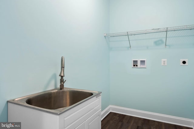 clothes washing area with electric dryer hookup, cabinets, sink, hookup for a washing machine, and dark hardwood / wood-style floors