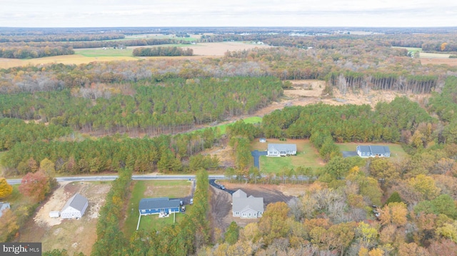 birds eye view of property featuring a rural view