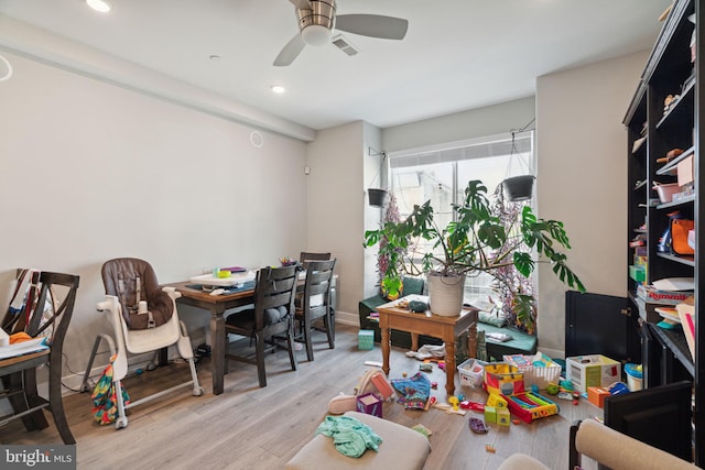 interior space featuring ceiling fan and light hardwood / wood-style flooring