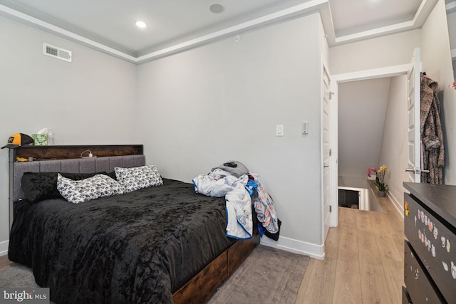 bedroom featuring light wood-type flooring