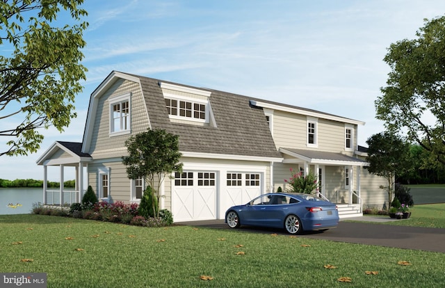 view of front of property with a front lawn and a garage