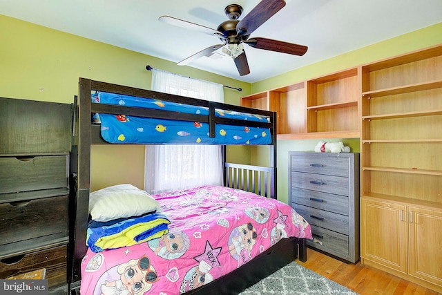 bedroom featuring ceiling fan and light wood-type flooring