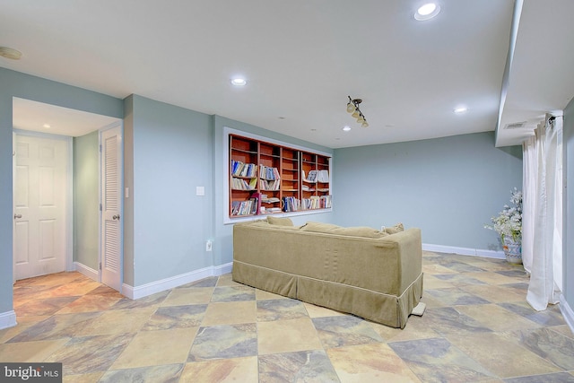 living room featuring light tile floors