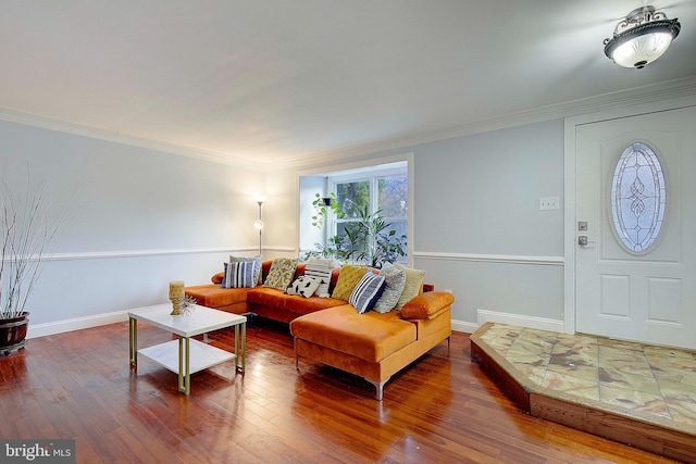 living room featuring ornamental molding and dark wood-type flooring