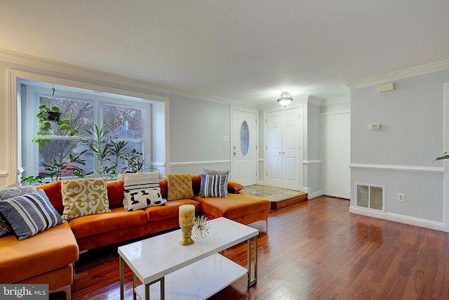 living room with crown molding and dark hardwood / wood-style flooring