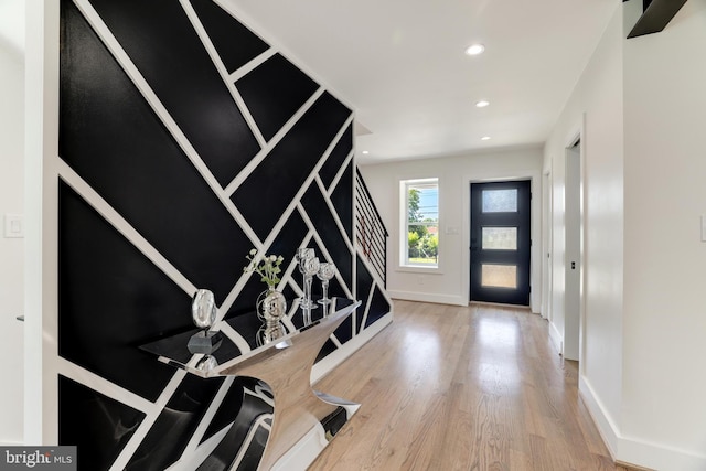 entrance foyer featuring light wood-type flooring