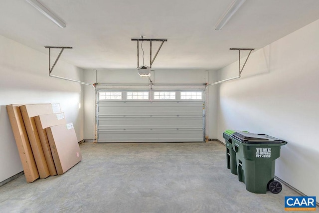 garage featuring a garage door opener