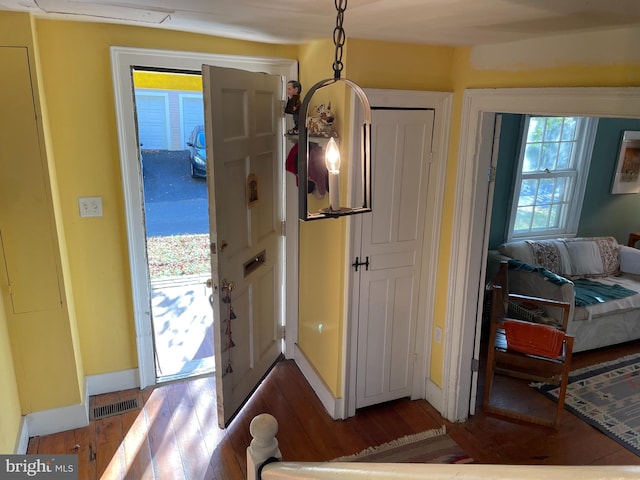 foyer entrance featuring dark hardwood / wood-style flooring