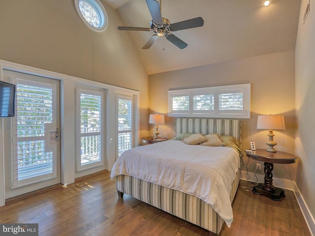 bedroom with dark hardwood / wood-style floors, high vaulted ceiling, ceiling fan, and access to exterior