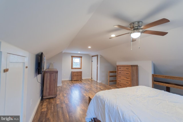 bedroom featuring vaulted ceiling, ceiling fan, and dark wood-type flooring