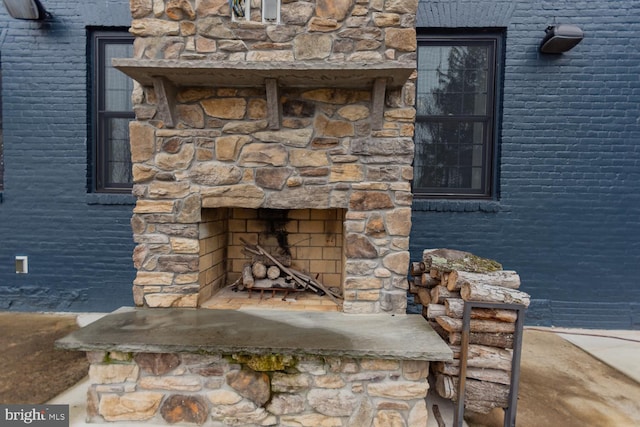 details with a stone fireplace