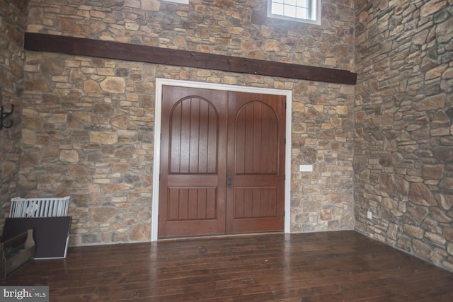 entrance foyer featuring hardwood / wood-style floors