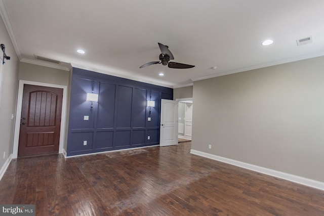 unfurnished bedroom featuring ornamental molding, ceiling fan, and dark wood-type flooring