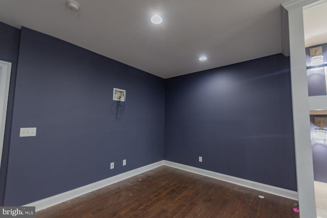spare room featuring hardwood / wood-style flooring
