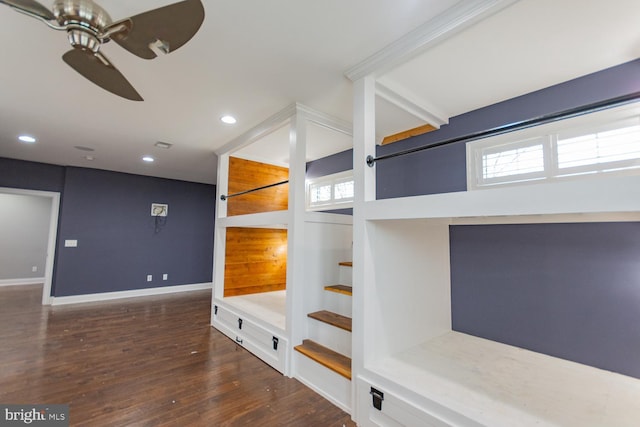 interior space featuring dark hardwood / wood-style floors, ceiling fan, and a wealth of natural light