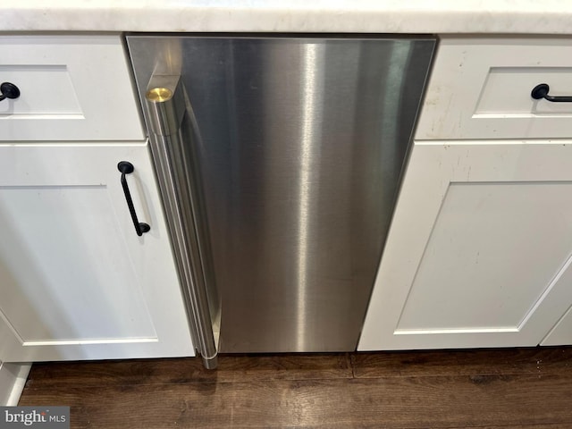 room details with dishwasher and white cabinetry