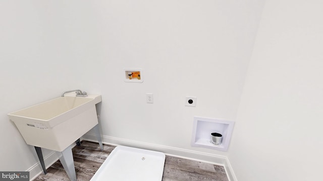 laundry room featuring hookup for an electric dryer, wood-type flooring, and hookup for a washing machine