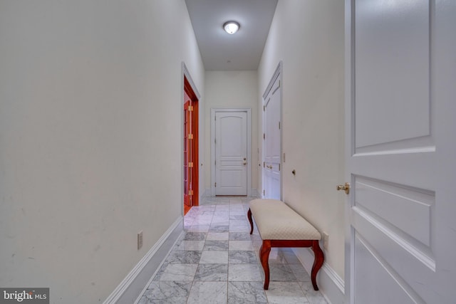 hallway with light tile floors