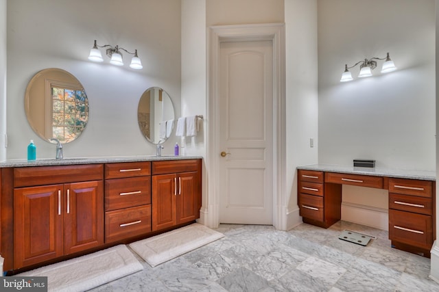 bathroom featuring vanity with extensive cabinet space and tile flooring