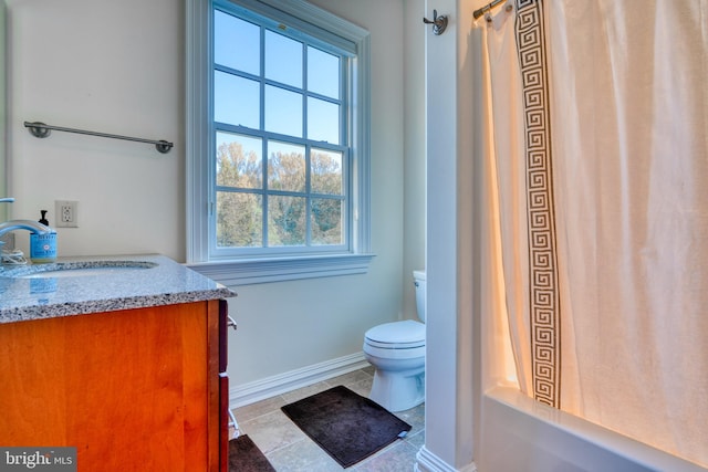 full bathroom with tile flooring, shower / bath combination with curtain, toilet, and vanity