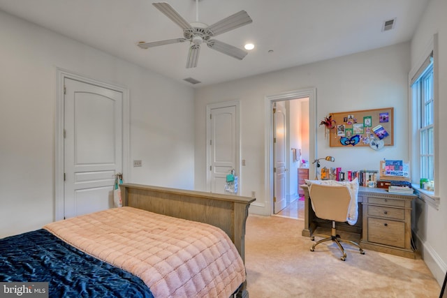 carpeted bedroom featuring ceiling fan