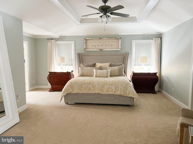 bedroom with light colored carpet, ceiling fan, and crown molding